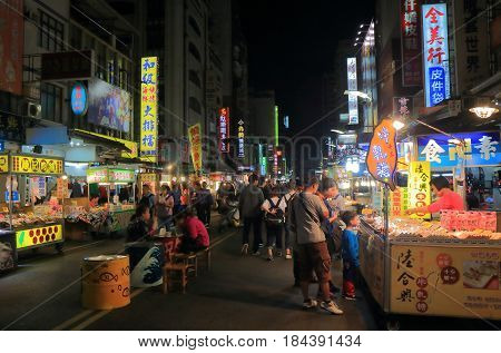 KAOHSIUNG TAIWAN - DECEMBER 13, 2016: Unidentified people visit Liuhe night street market. Liuhe market is one of the most popular markets in Taiwan.