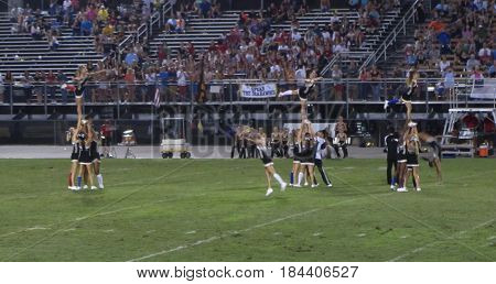 cheerleaders performing at halftime, Myrtle Beach High School vs Socastee High School football game, Myrtle Beach, South Carolina, September 11th, 2015