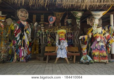 Asian Thai Woman Wearing Mask Head With Costume Of Phi Ta Khon Dance And Playing At Phi Ta Khon Muse