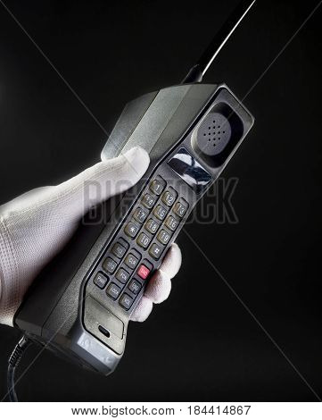 Oold original bulky brick type cell phone.