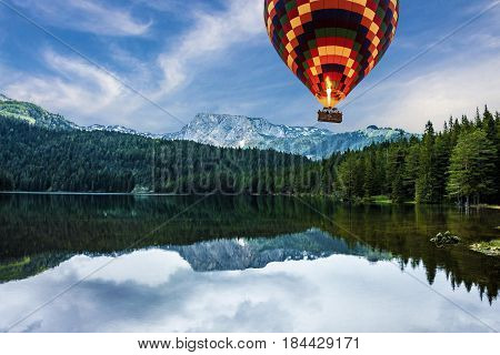 Montenegro, Durmitor national park. Hot air balloon mountain lake landscape