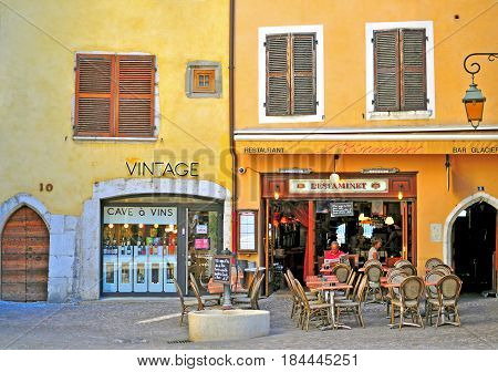 ANNECY FRANCE - AUGUST 22 2015: Facade of a french restaurant in old town of Annecy on August 22 2015. Annecy is a capital of Haute Savoie province France.