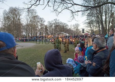 NORRKOPING, SWEDEN - APRIL 30, 2017: Traditional Swedish celebration of spring at Walpurgis night with bonfire and music at Folkparken in Norrkoping. The festival is named after Saint Walpurga.