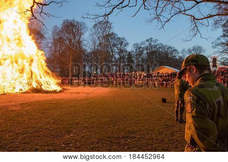 NORRKOPING, SWEDEN - APRIL 30, 2017: Traditional Swedish celebration of spring at Walpurgis night with bonfire and music at Folkparken in Norrkoping. The festival is named after Saint Walpurga.