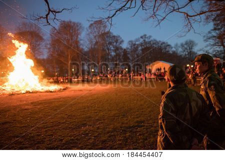 NORRKOPING, SWEDEN - APRIL 30, 2017: Traditional Swedish celebration of spring at Walpurgis night with bonfire and music at Folkparken in Norrkoping. The festival is named after Saint Walpurga.