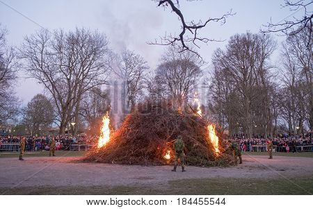 NORRKOPING, SWEDEN - APRIL 30, 2017: Traditional Swedish celebration of spring at Walpurgis night with bonfire and music at Folkparken in Norrkoping. The festival is named after Saint Walpurga.