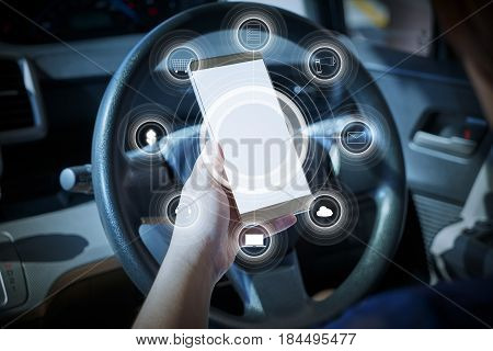Women holding smart phone making online shopping and banking payment. inside car lurred background .