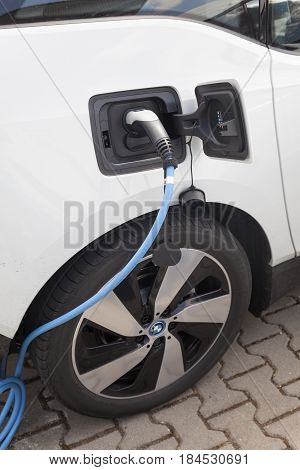 Frankfurt Germany - March 30 2017: BMW i3 electric vehicle at a charging station