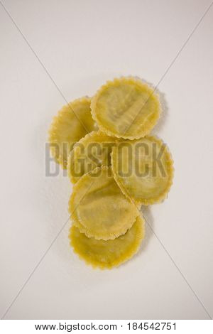 Round ravioli pasta isolated on white background