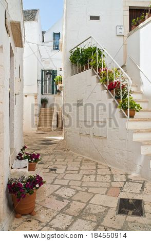 Characteristic alleyway of Locorotondo. Puglia. Southern Italy.