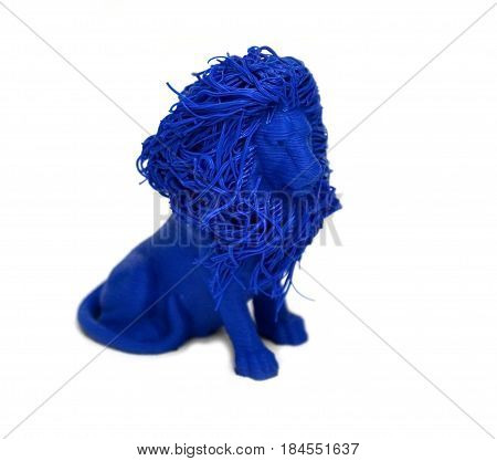 Objects printed by 3d printer Isolated on white background. Bright colorful object. Toy lion of blue color. Automatic three dimensional 3d printer performs plastic modeling in laboratory.