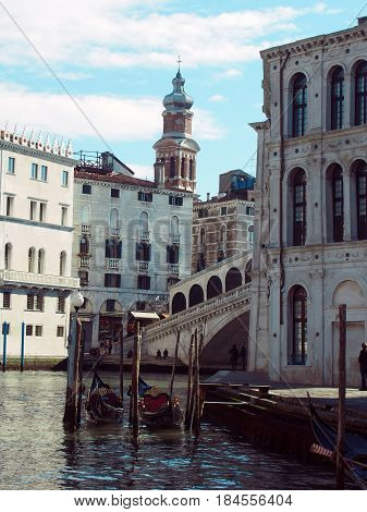 Canal in venice showing the rialto bridge