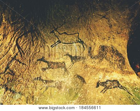 Paint Of Human Hunting Of Deers, Mammoth And Reindeer. Historical Black Carbon Abstract Art