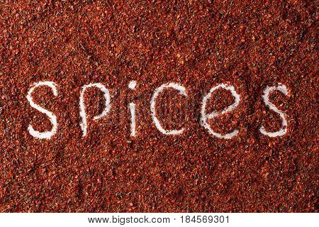 Red pepper spice square isolated on white background. Texrure.