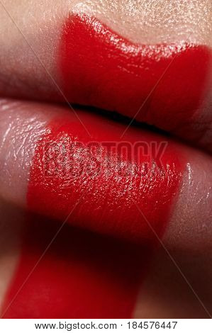 Macro beauty Woman's Lips with red Paint. Creative Make-up Art for Poster or Magazine