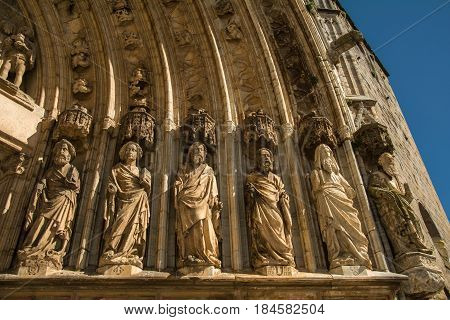 Sculptures of the Apostles on the entrance of the Santa Maria Basilica de Castello d'Empuries Catalonia Spain