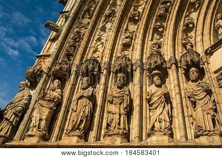 Sculptures of the Apostles on the entrance of the Santa Maria Basilica de Castello d'Empuries Catalonia Spain