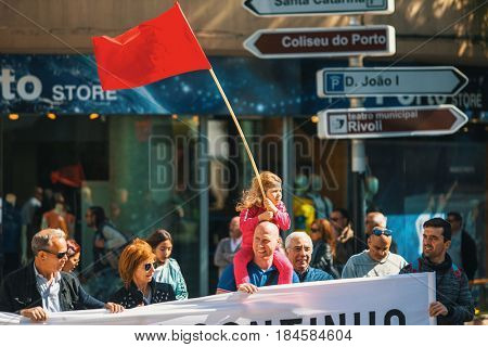 PORTO, PORTUGAL - MAY 1, 2017: During celebration of May Day in the city centre. General Confederation of Portuguese workers, traditionally associated with the Communist party, has 800.000 members.