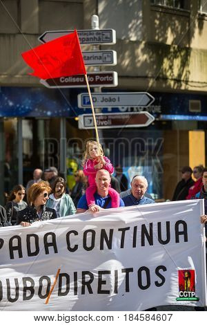 PORTO, PORTUGAL - MAY 1, 2017: During celebration of May Day in the city centre. General Confederation of Portuguese workers, traditionally associated with the Communist party, has 800.000 members.