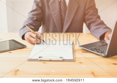Looking for direction and inspiration, Business working at an office, Office desk table with computer, supplies, flower. Top view. Copy space for text