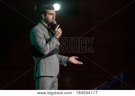 Moscow, Russia - April 24, 2017: Famous Russian showman Ivan Urgant performs at Synergy Global Forum at Crocus Expo Hall. This is one of the largest business forums with more than 5000 participants