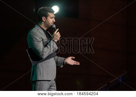 Moscow, Russia - April 24, 2017: Famous Russian showman Ivan Urgant performs at Synergy Global Forum at Crocus Expo Hall. This is one of the largest business forums with more than 5000 participants