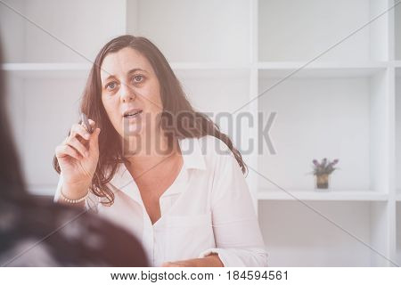 Looking for direction and inspiration, Business working at an office, Office desk table with computer, supplies, flower. Top view. Copy space for text