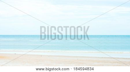Blur abstract background of sea beach and shore with blue skysummer concept.