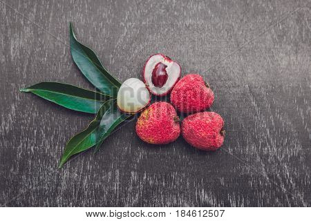 Fresh Litchi Fruit On An Old Wooden Background