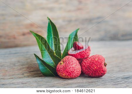Fresh Litchi Fruit On An Old Wooden Background