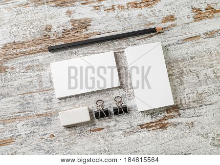 Blank stationery set. Mockup for your design. Responsive design template. Bank business cards pencil eraser badge and sharpener. Top view.