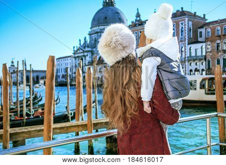 Mother And Daughter Travellers In Venice Having Excursion