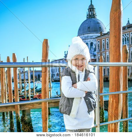 Happy Young Child Standing In Venice, Italy In Winter