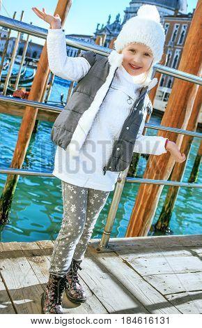 Smiling Young Child In Venice, Italy In Winter Having Fun Time