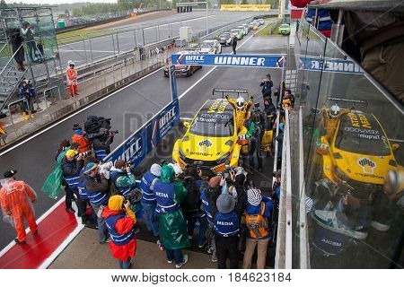 Moscow, Russia - 12 June 2016: world championship WTCC at the Moscow Raceway. Gabriele Tarquini team Lada Sport Rosneft rejoices in the victory posing in front of photographers