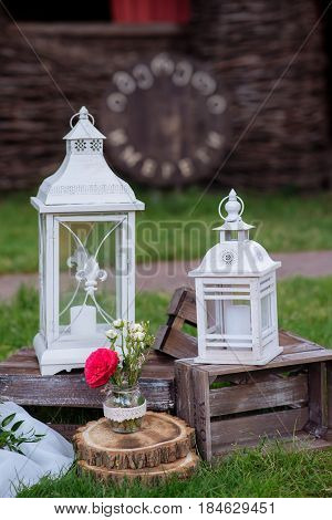 Beautiful Wedding Ceremony Outdoors. Decorated Chairs Stand On The Grass. Wedding Arch Made  Flowers