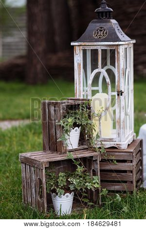 Beautiful Wedding Ceremony Outdoors. Decorated Chairs Stand On The Grass. Wedding Arch Made  Flowers