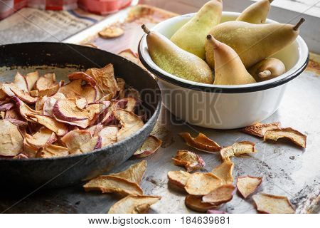 Dried apples and pears in bowls. Rustic vintage style. Countryside