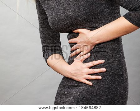 Woman Having Strong Stomach Ache. Syndroms
