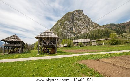 Traditional wooden double hayrack in small village of Studor near Bohinj in Slovenia during spring time