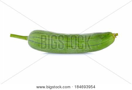 unpeeled fresh luffa gourd with stem on white background