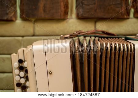 Close-up of old Russian traditional musical instrument bayan