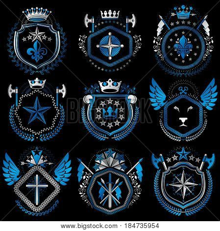 Heraldic emblems with wings isolated on white backdrop. Collection of vector symbols in vintage style created using heraldry elements like crowns towers crosses and armory.