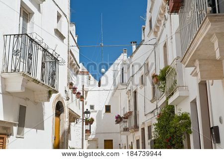 Characteristic alleyway of Locorotondo. Puglia. Southern Italy.
