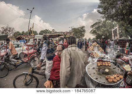 Delhi, India - January 27, 2017: Ordinary Crowdy City Life At Chandni Chowk, Old Delhi, Famous Trave