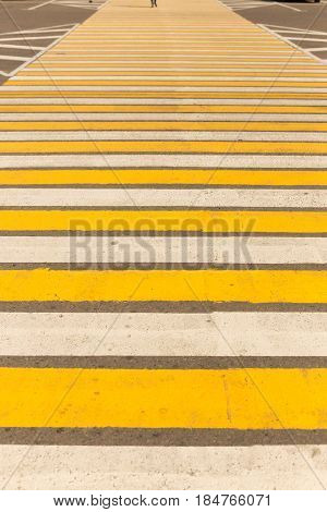 Large Pedestrian Crossing Striped White And Yellow.