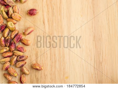 Heap Of Inshell Pistachios And Peeled Pistachios