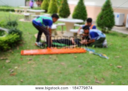 blurred of emergency medical service. Paramedic is pulling stretcher with assist a patient in rescue situations.