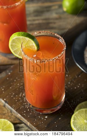 Homemade Michelada With Beer And Tomato Juice