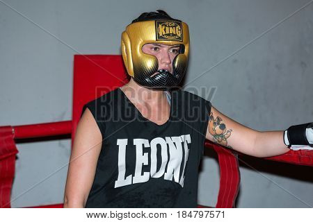 CRACOW POLAND - FEBRUARY 12 2016: Agnieszka Niestoj - talented Polish boxer durning boxing training with coach in the gym. Cracow Poland